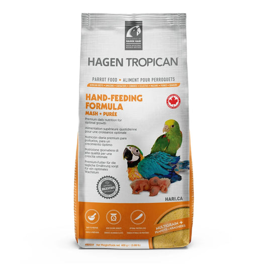A bag of Hagen Tropican Hand-Feeding Formula for Harlca (Mash + Puree) parrots, featuring a white and orange package with illustrations of a green and blue parrot and a baby parrot.
